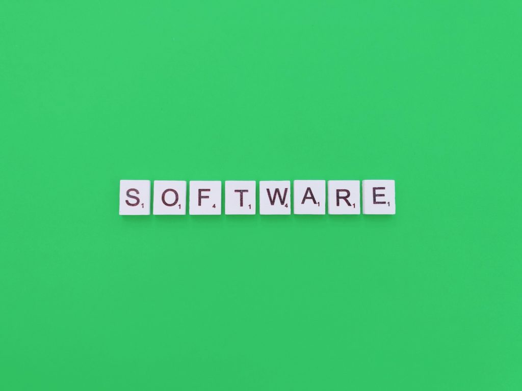 Software spelled with Scrabble letters on a green background